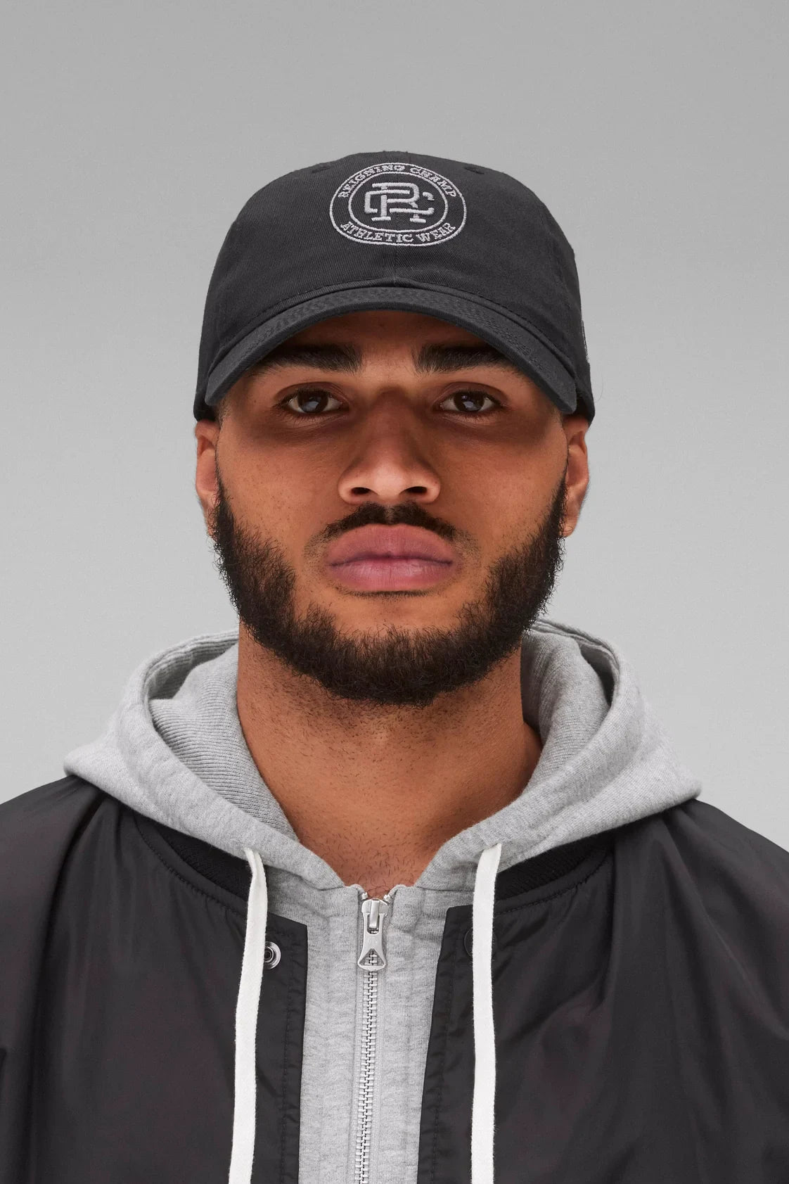 New Era 9Twenty Crest Cap Hats Reigning Champ