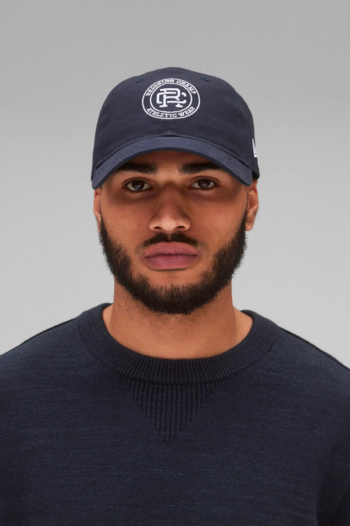 New Era 9Twenty Crest Cap Hats Reigning Champ